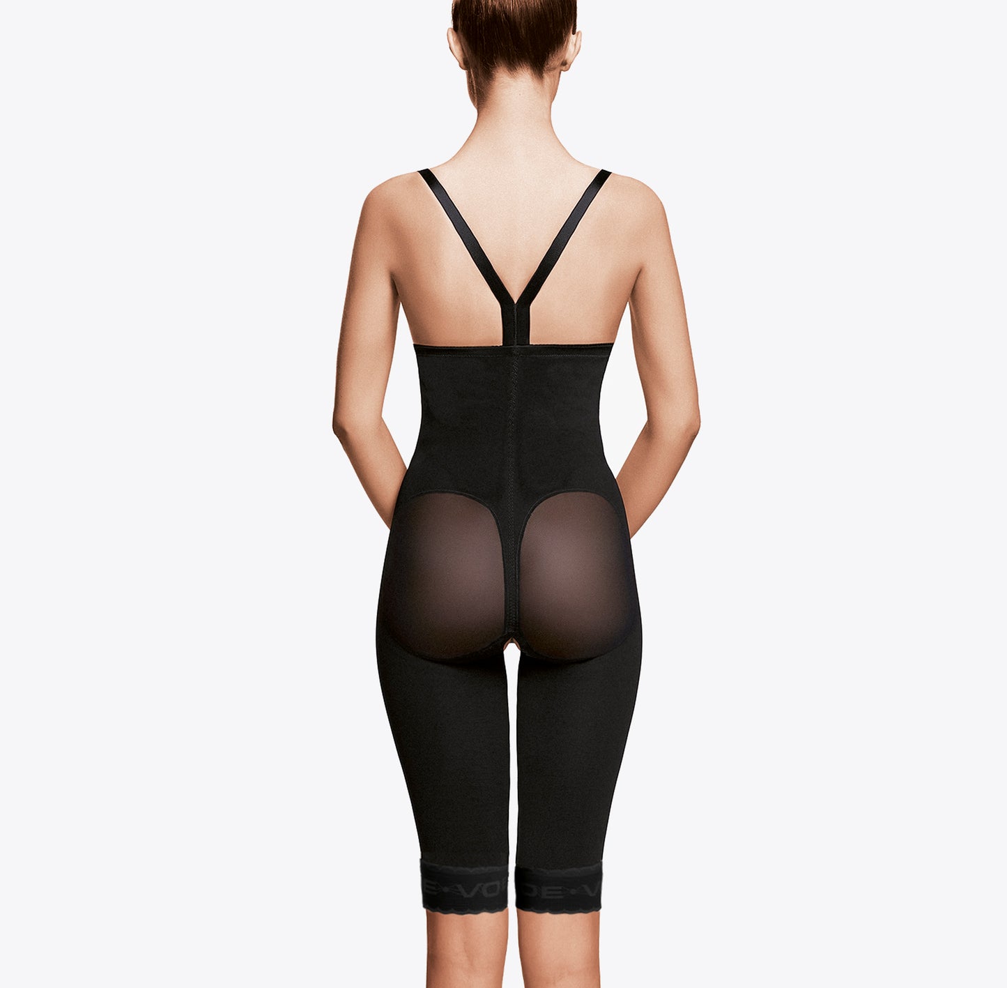 Faja postquirúrgica negra con compresión médica, diseño trasero con tirantes y panel transparente en glúteos
